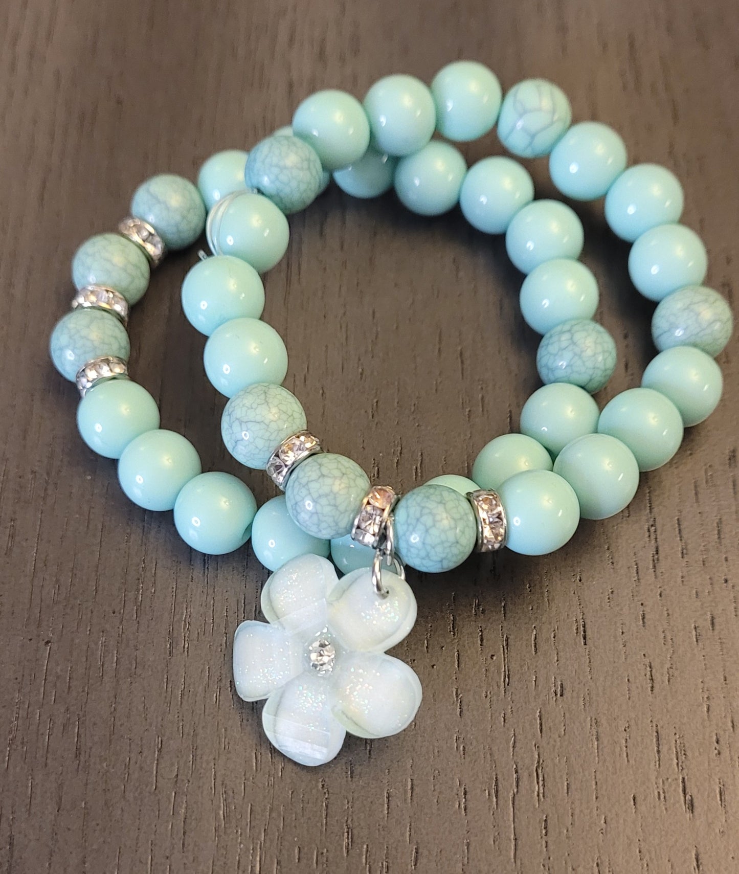 Teal bracelet set with flower charm