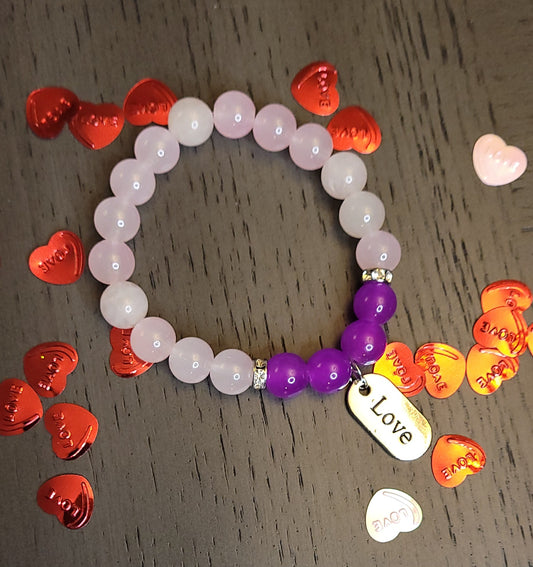 Light pink/purple bracelet w/love charm