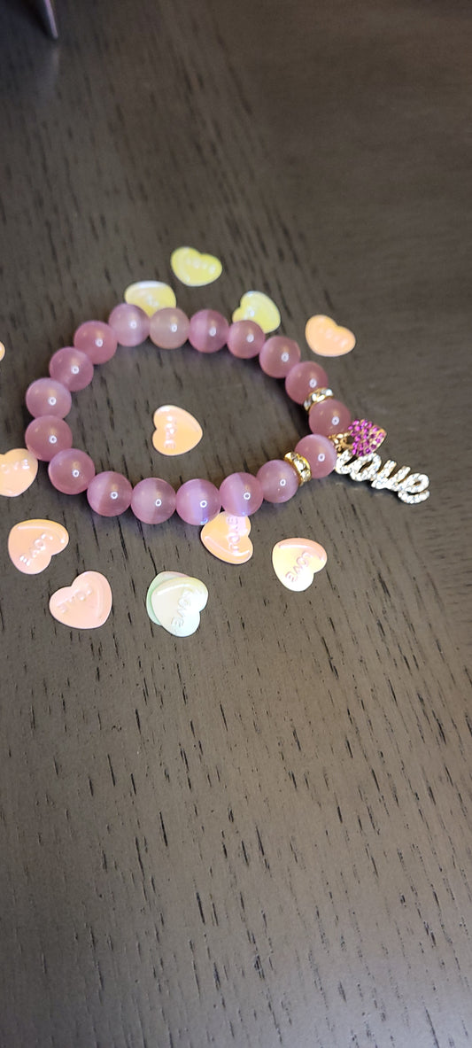 Love heart charm pink bracelet