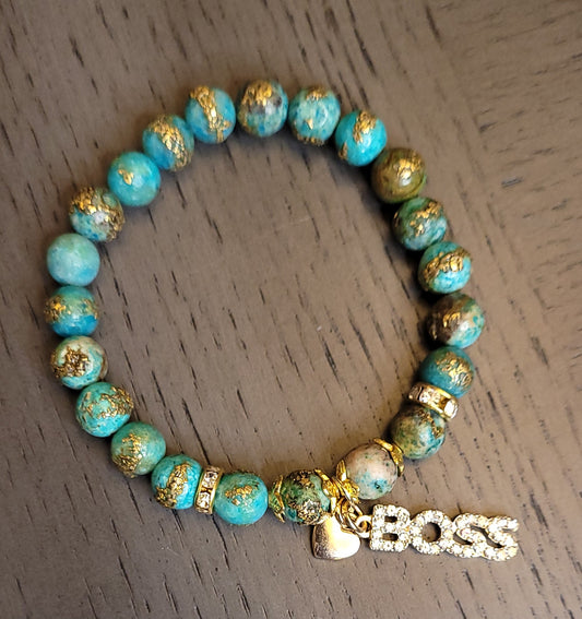 Boss charm gold accent bracelet