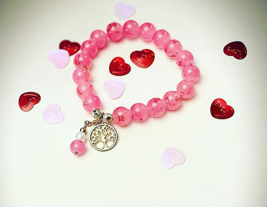 Pink stretch bracelet w/life charm